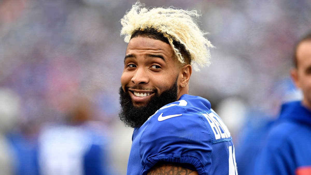 Odell Beckham Jr. smirking in a close-up portrait