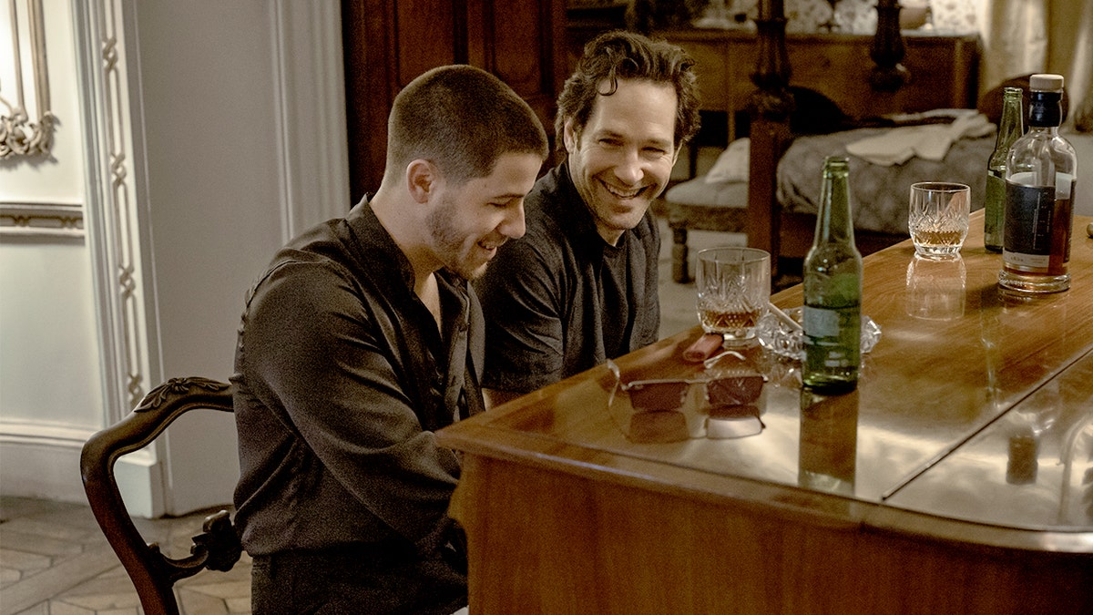 Nick Jonas, Paul Rudd in Power Ballad