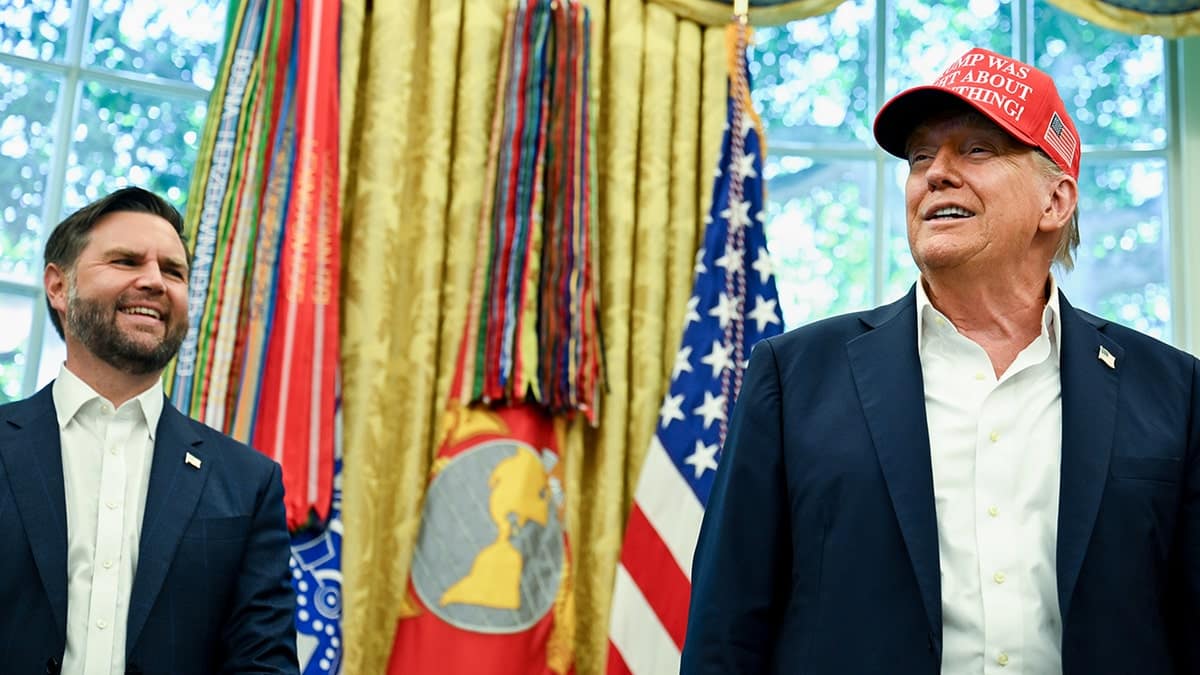 Vice President JD Vance and President Donald Trump standing in the Oval Office of the White House