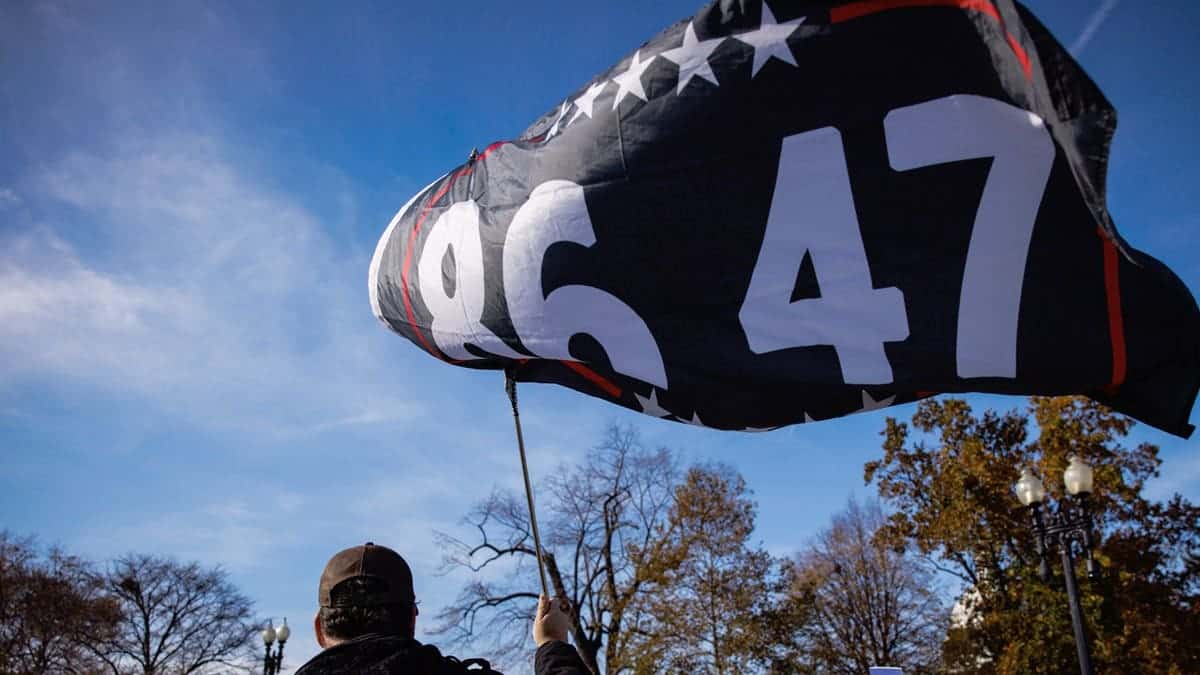 protestor waving 8647 flag