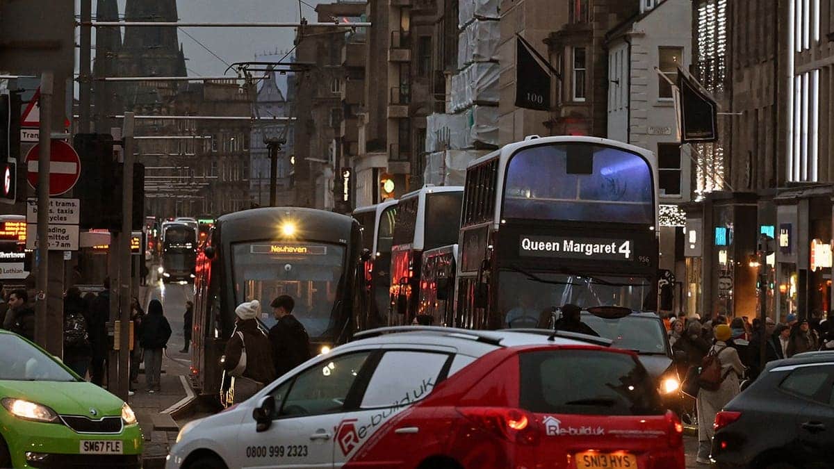 Princes Street busy with people and traffic in Edinburgh