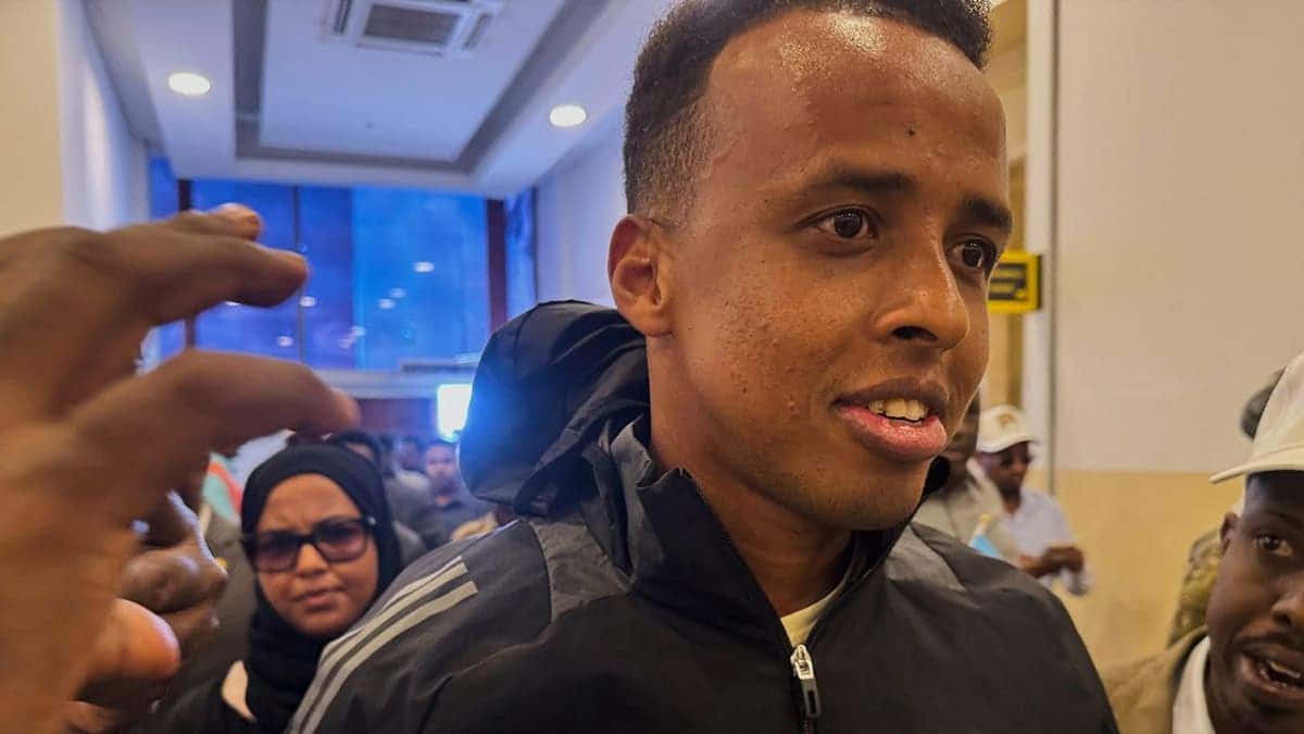 Referee Omar Artan arriving at an airport in Mogadishu, Somalia.