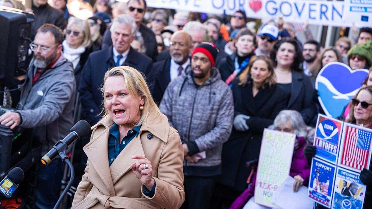 Rep. April McClain Delaney speaking at a rally outside NOAA headquarters in Silver Spring, Maryland