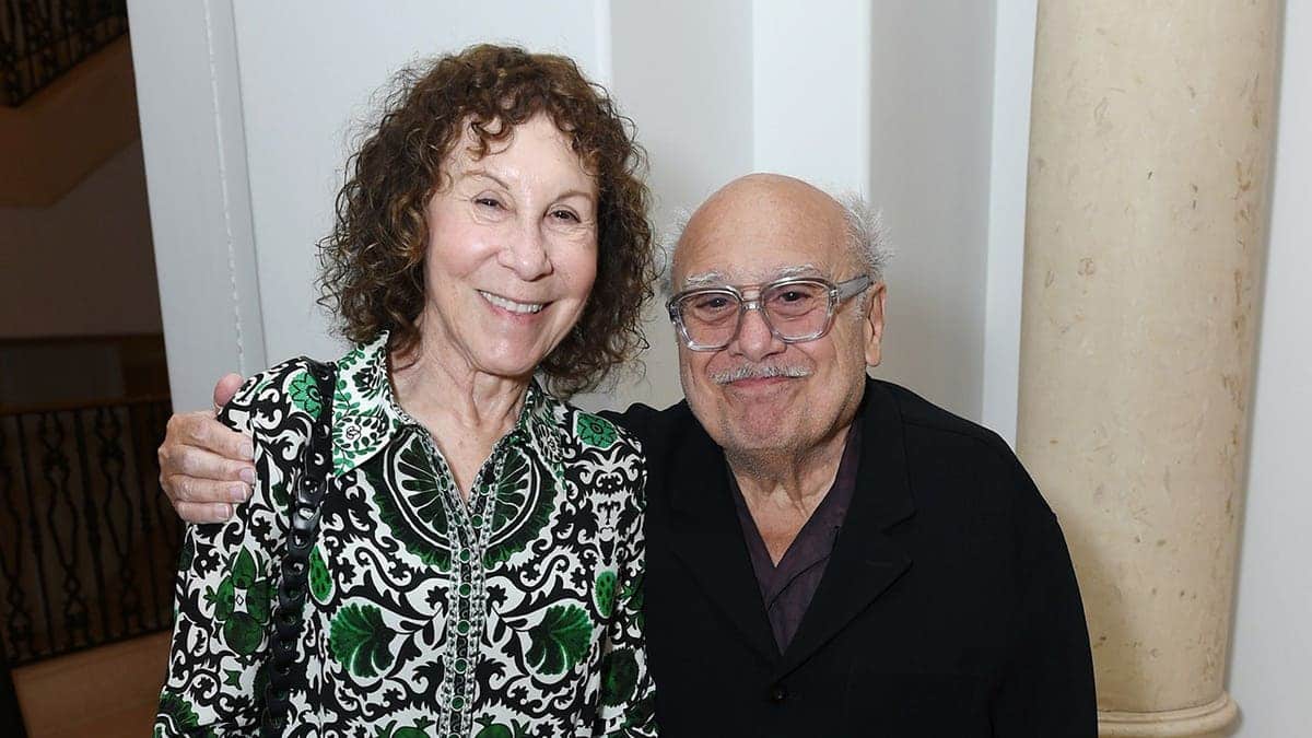 Rhea Perlman and Danny DeVito standing together at an event in Beverly Hills
