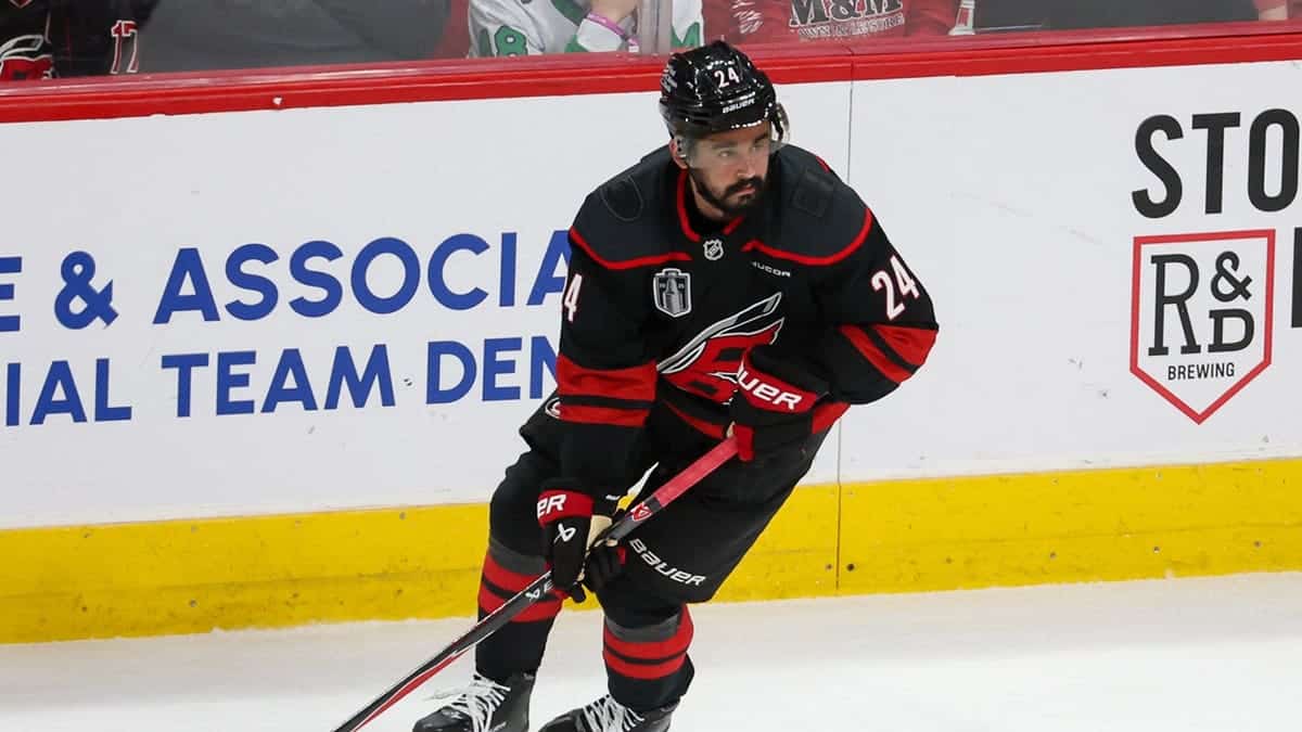 Seth Jarvis of the Carolina Hurricanes looks to pass during NHL Stanley Cup Final game.