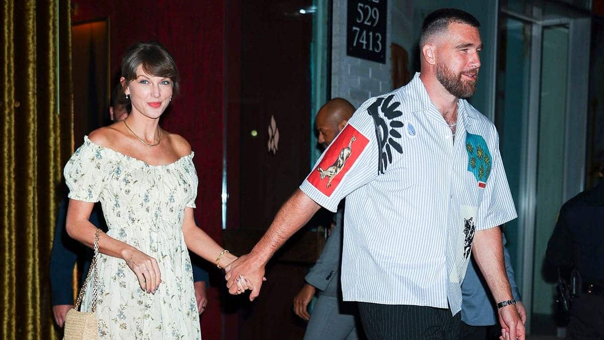 Taylor Swift and Travis Kelce standing together in New York City
