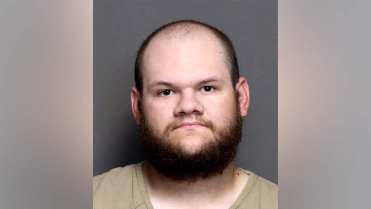 Tycen Proper facing forward in a mugshot photo.