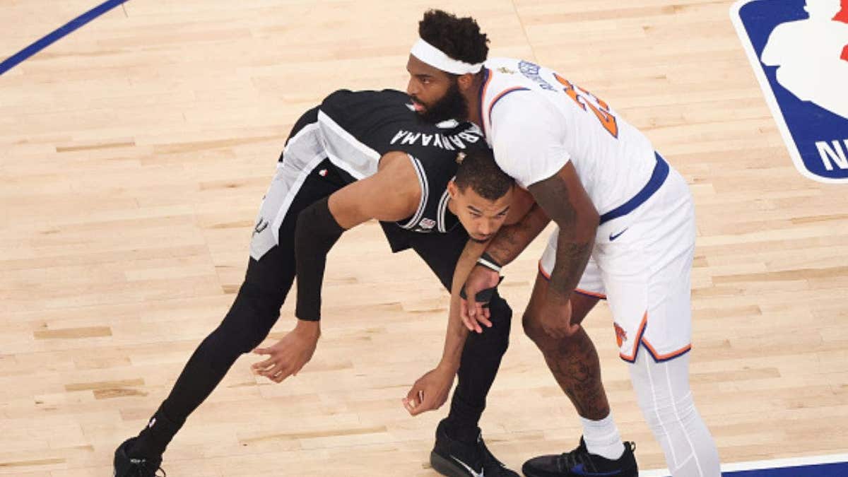 Victor Wembanyama and Mitchell Robinson battle inside during a heated Game 4 at Madison Square Garden. (Photo by Joe Murphy/NBAE via Getty Images)