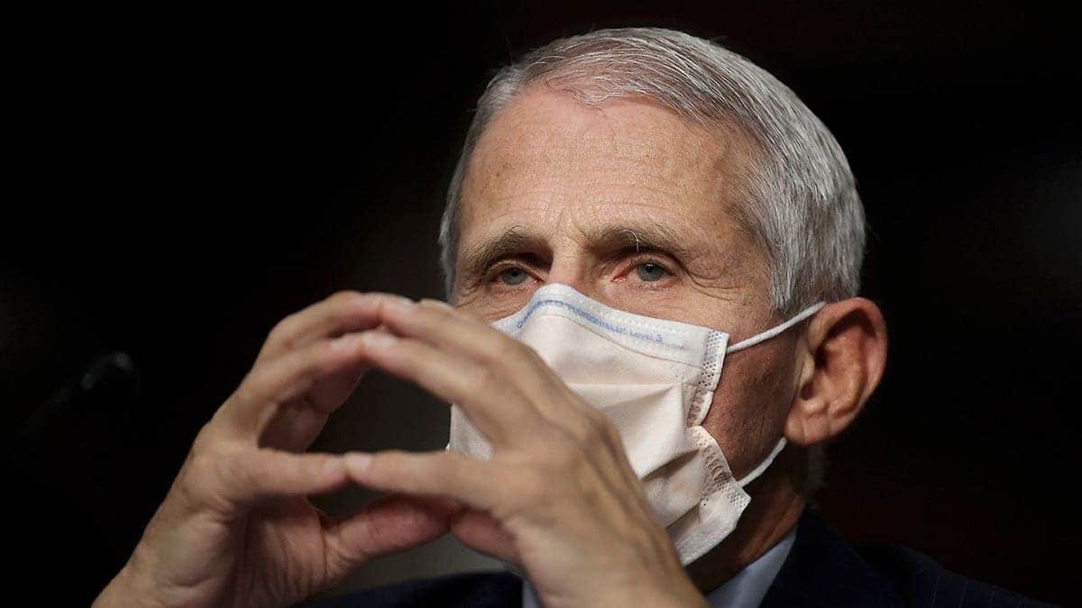Anthony Fauci speaking at a Senate hearing while wearing a mask
