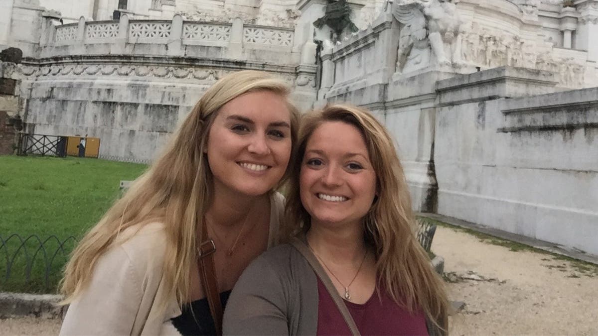 Brooke, left stands for photo with Jennifer, right