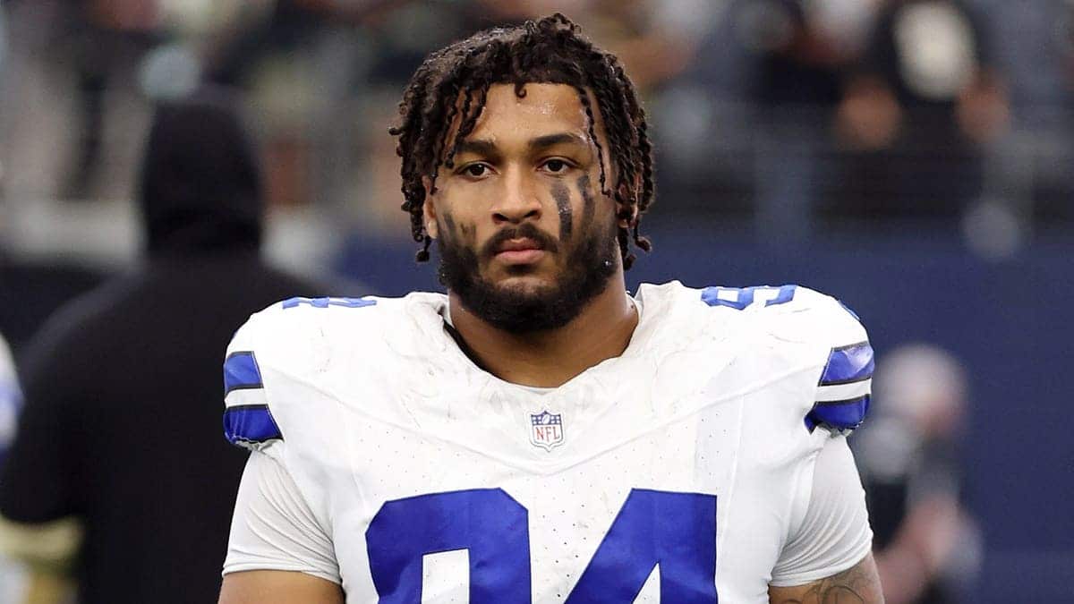 Marshawn Kneeland walks off field