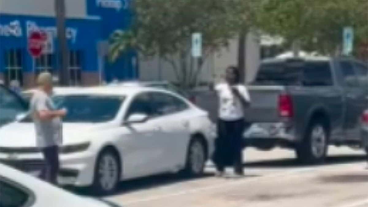 Bart Diguglielmo walks toward a woman holding what appears to be a cellphone in a Walmart parking lot before the fatal shooting in North Lauderdale, Florida.