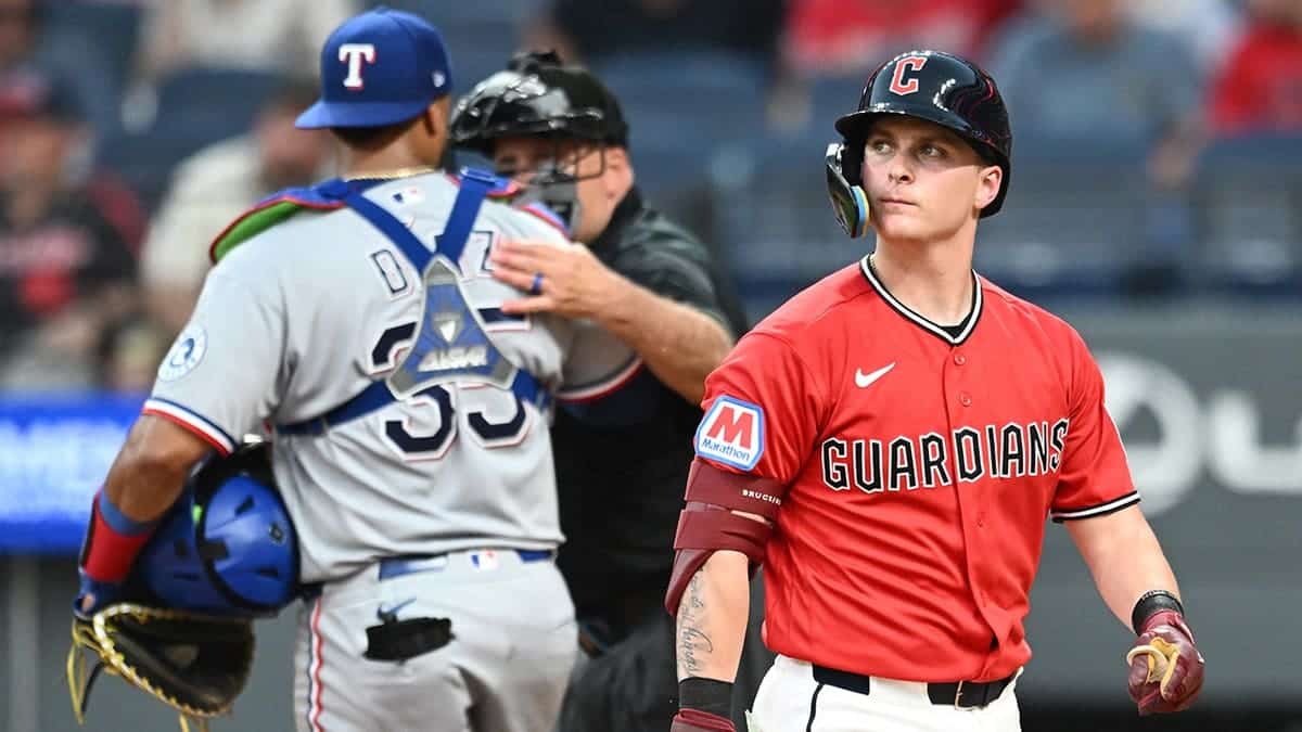 Cooper Ingle walks to the dugout