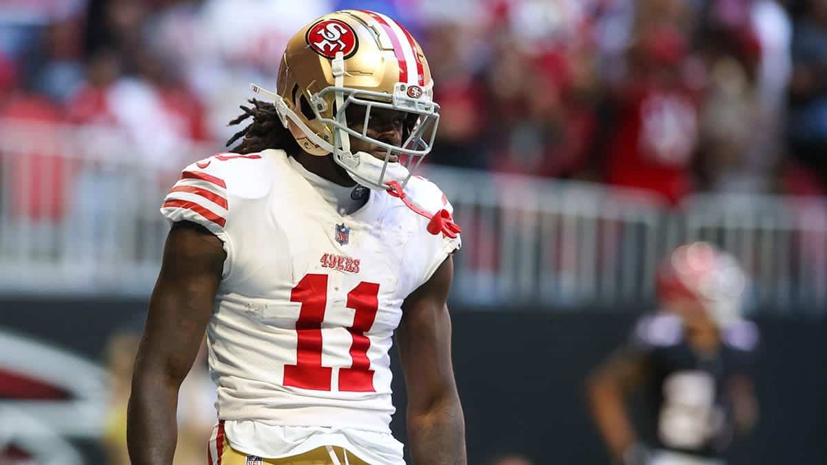 49ers wide receiver Brandon Aiyuk (11) celebrates after a touchdown against the Falcons at Mercedes-Benz Stadium.