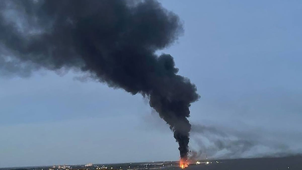 Smoke and flames rise from an industrial facility in Podolsk, Russia.