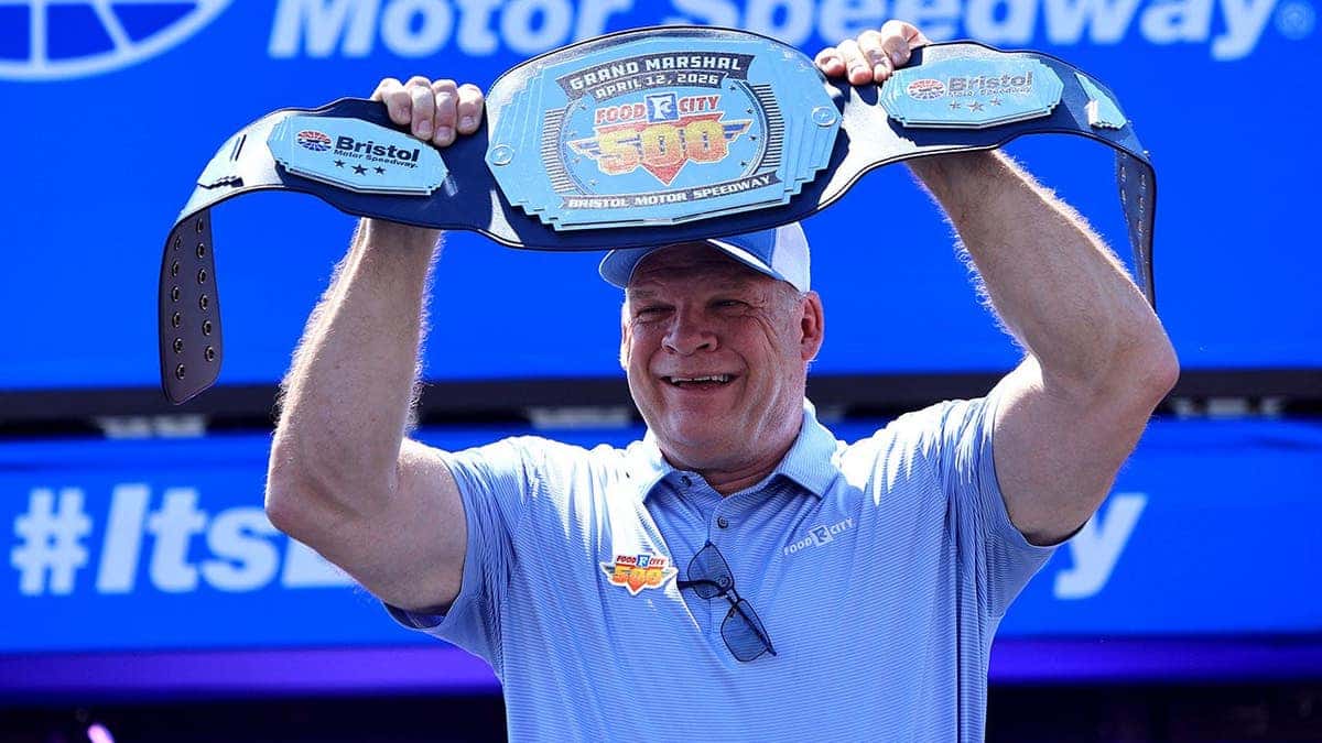 Knox County Mayor Glenn Jacobs, aka WWE's Kane, walks onto the pre-race stage at Bristol Motor Speedway.