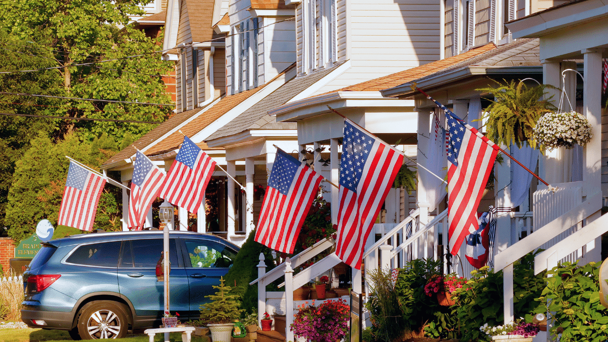 American flags hang outside homes along Brinley Avenue on Memorial Day weekend in Asbury Park, New Jersey.