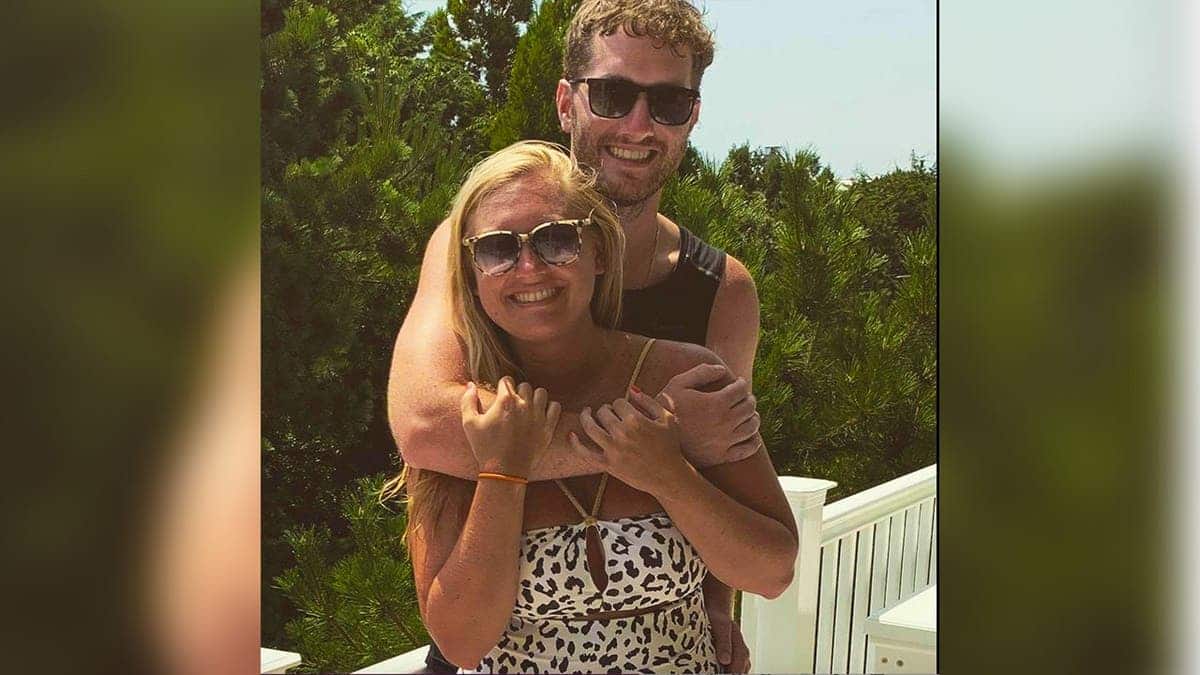 photo shows couple hugging