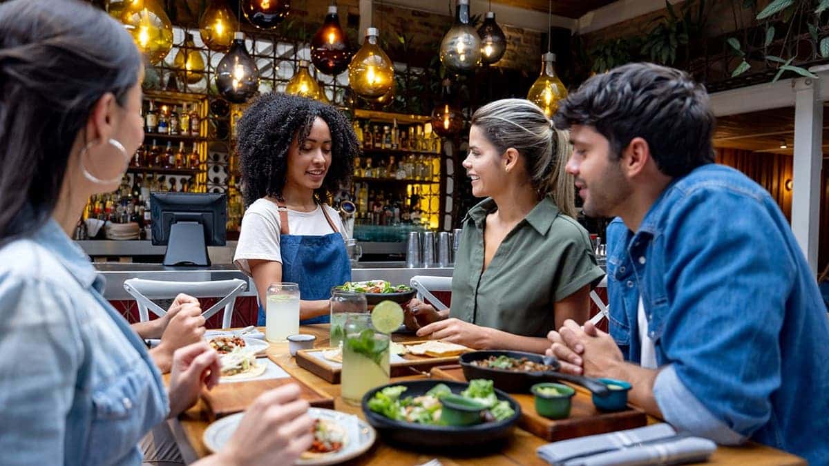 A group of people dines at a restaurant.