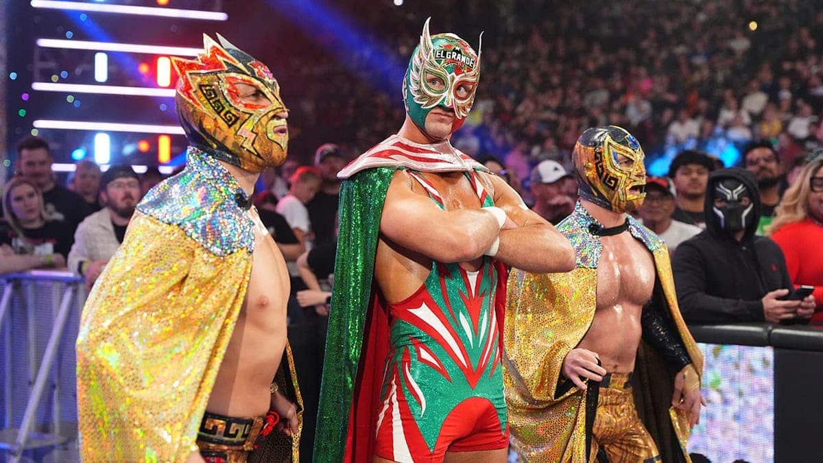 El Grande Americano entering arena accompanied by Rayo Americano and Bravo Americano during Monday Night RAW