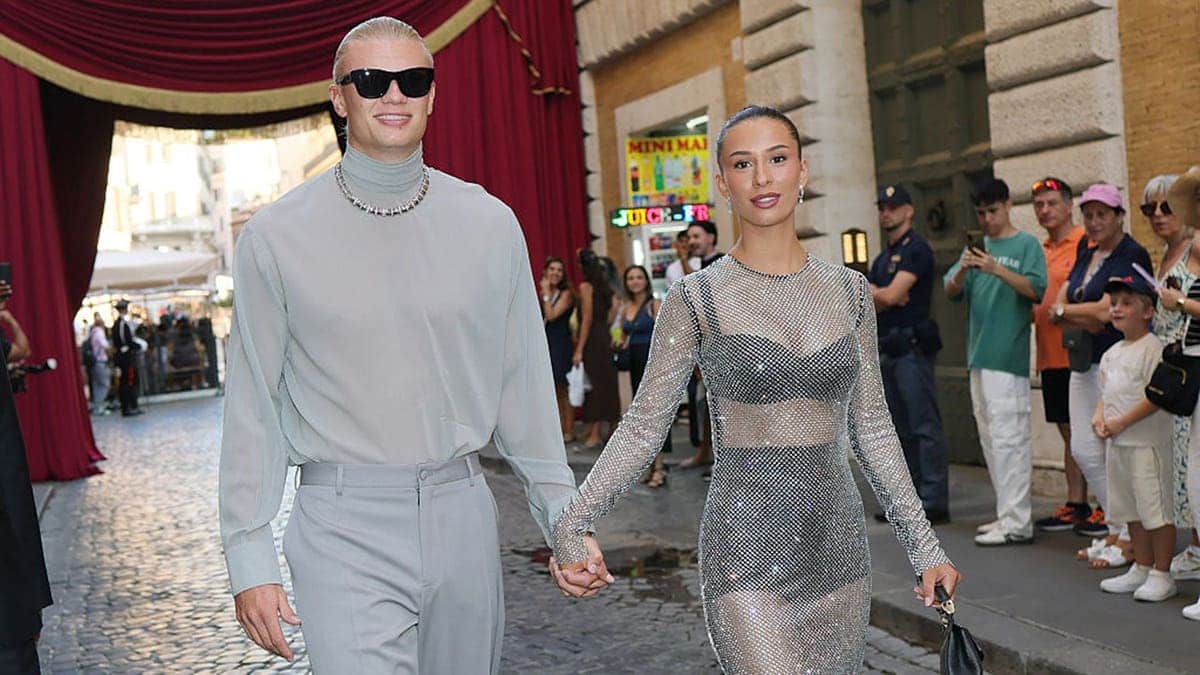 Norwegian soccer star Erling Haaland holds hands with girlfriend Isabel Haugseng Johansen