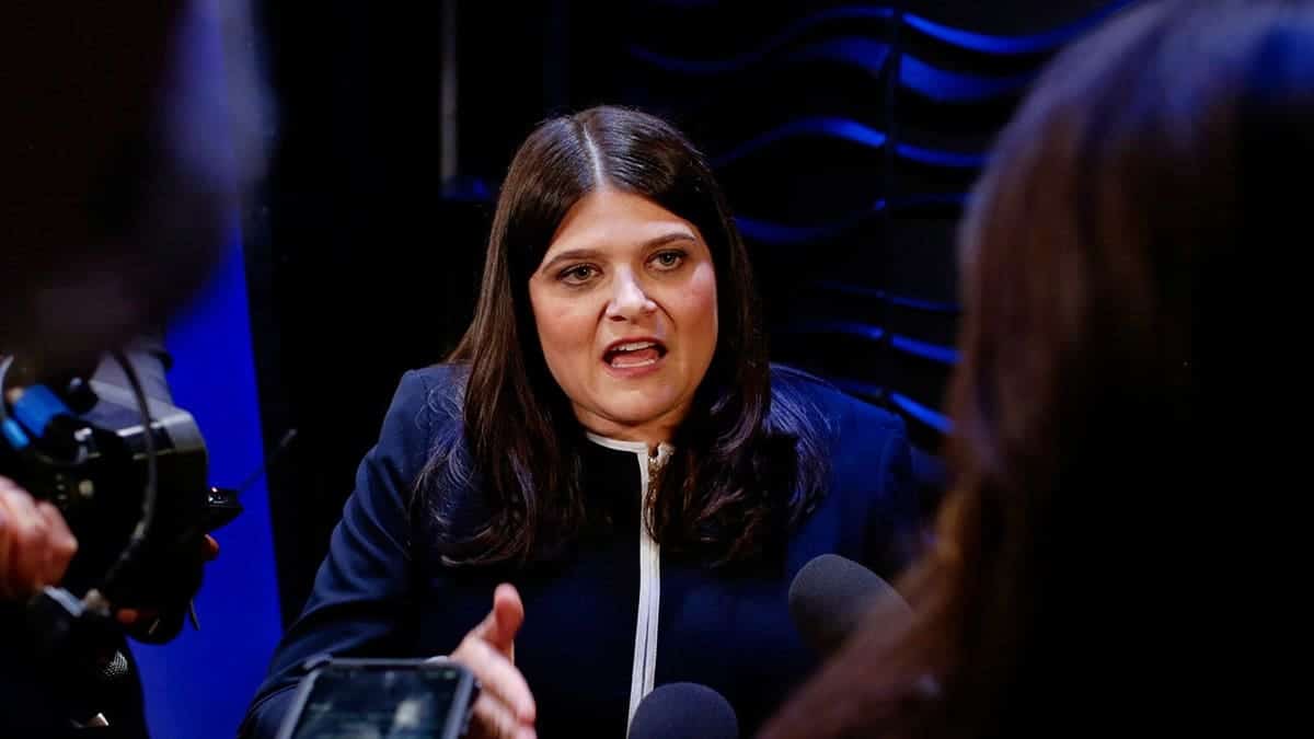 Rep. Haley Stevens speaks with media after a debate at WoodTV studios.