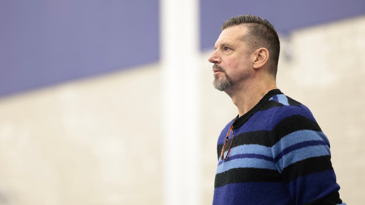 Todd Kress looks on