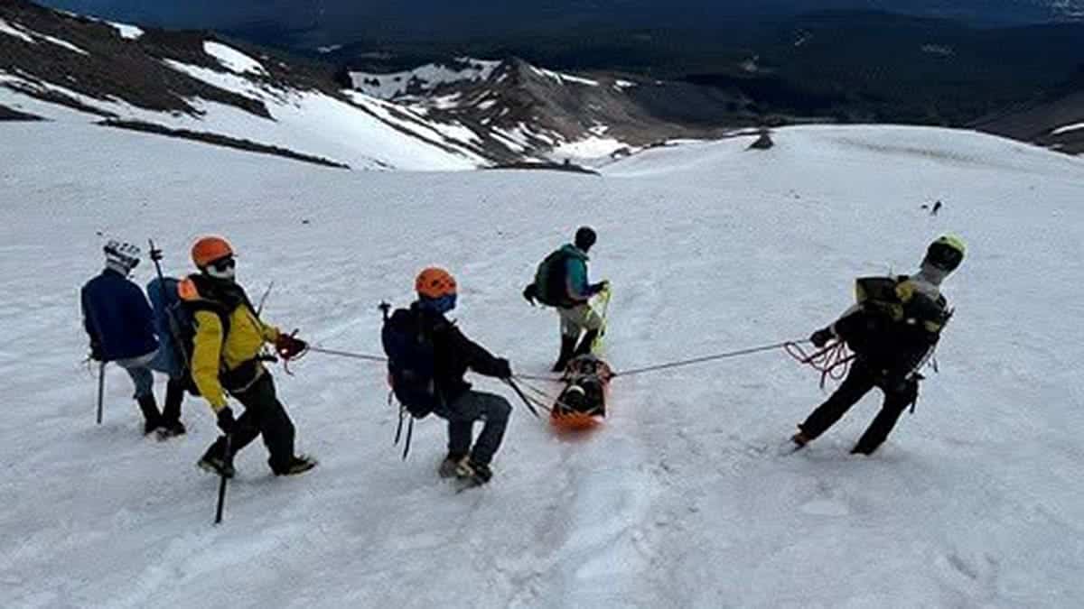 Rescuers transport injured climber down Mount Shasta