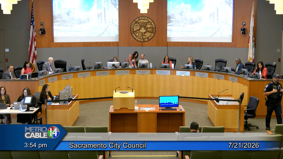 Sacramento Mayor Kevin McCarty and Vice Mayor Karina Talamantes speak during a hot-mic moment at a City Council meeting