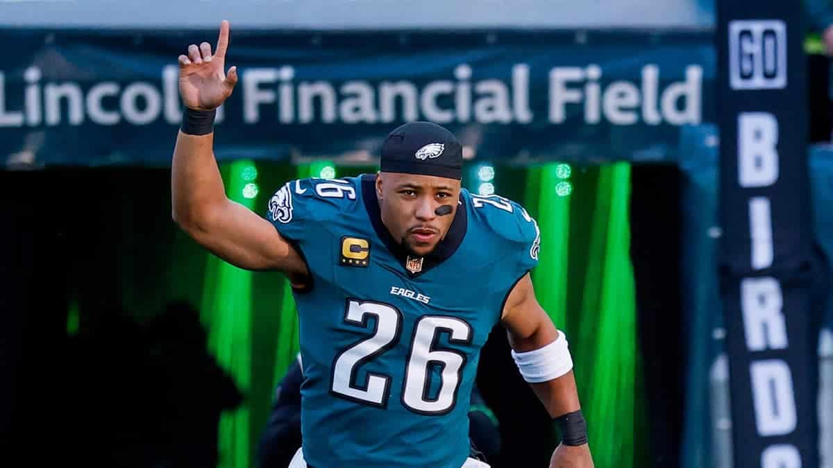 Saquon Barkley #26 takes the field before an NFC Wild Card playoff game.