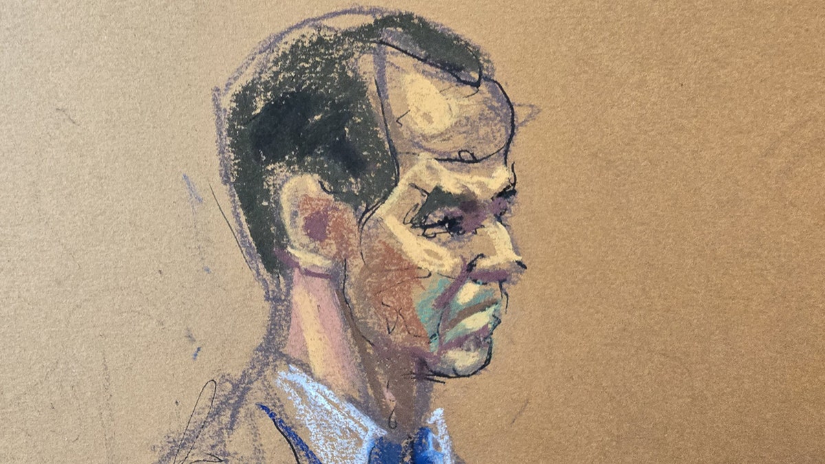 Mark Donnelly seated at a table during a legal hearing in a courtroom sketch.