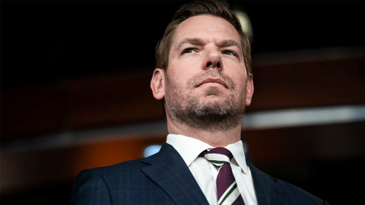 Rep. Eric Swalwell speaking at a podium
