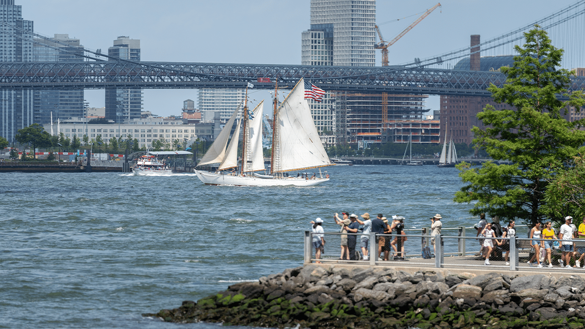 The tall ship Bowdoin sails along the East River during a preliminary parade on July 3, 2026, in New York City.