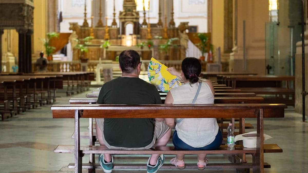 A couple sitting in church