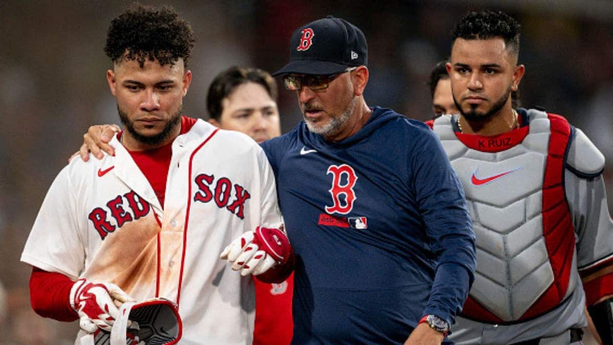 Willson Contreras reacts with interim bench coach José David Flores after fourth-inning ejection versus Nationals. (Photo by Maddie Malhotra/Boston Red Sox/Getty Images)