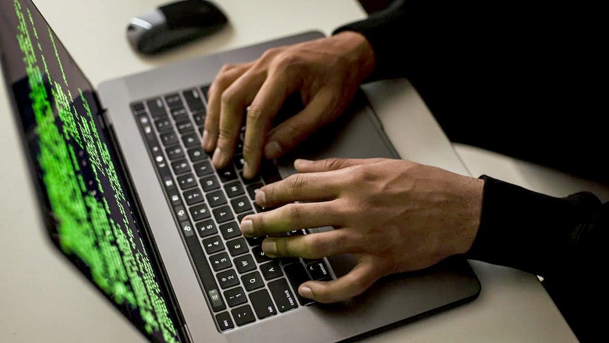 Person typing on computer