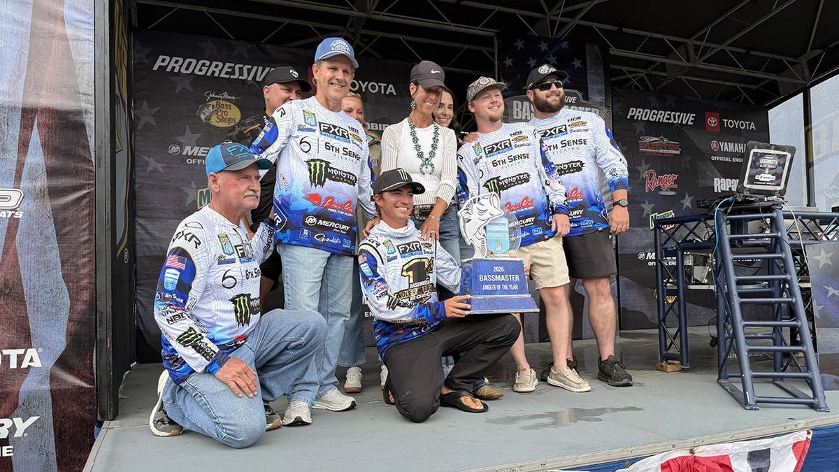 Trey McKinney celebrates his Bassmaster Angler of the Year win with friends and family.