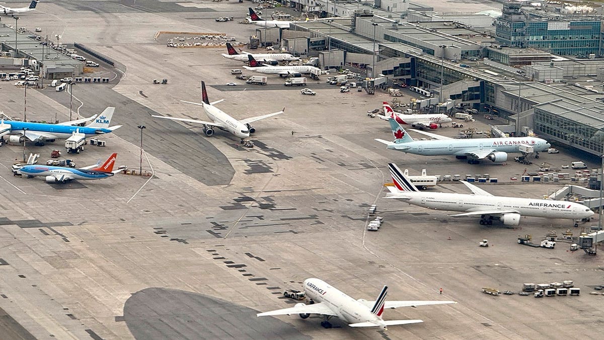 Aerial view of multiple planes at Montreal airport