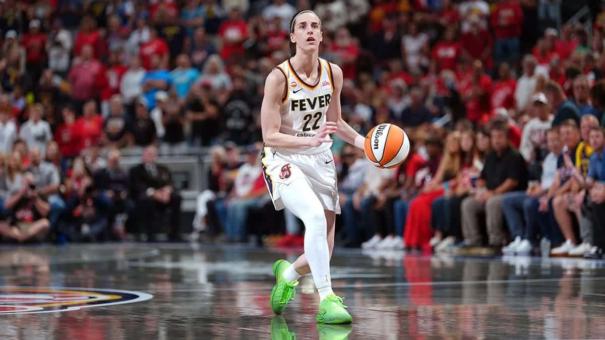 Caitlin Clark looks to shoot during a WNBA game