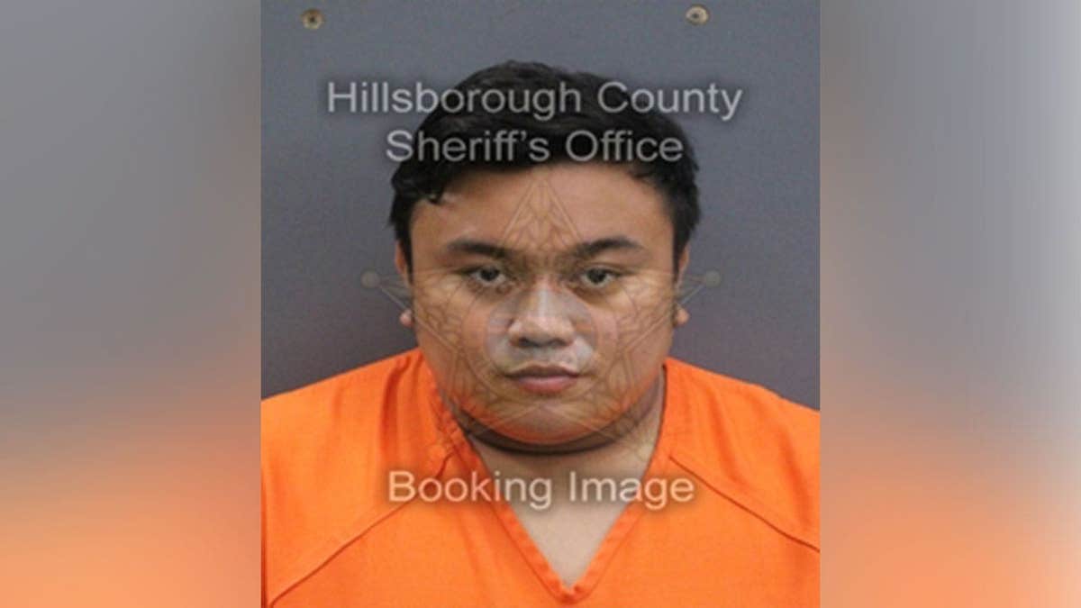Booking photo of Memorial Middle School teacher Christian Schneider following his arrest in Hillsborough County, Florida
