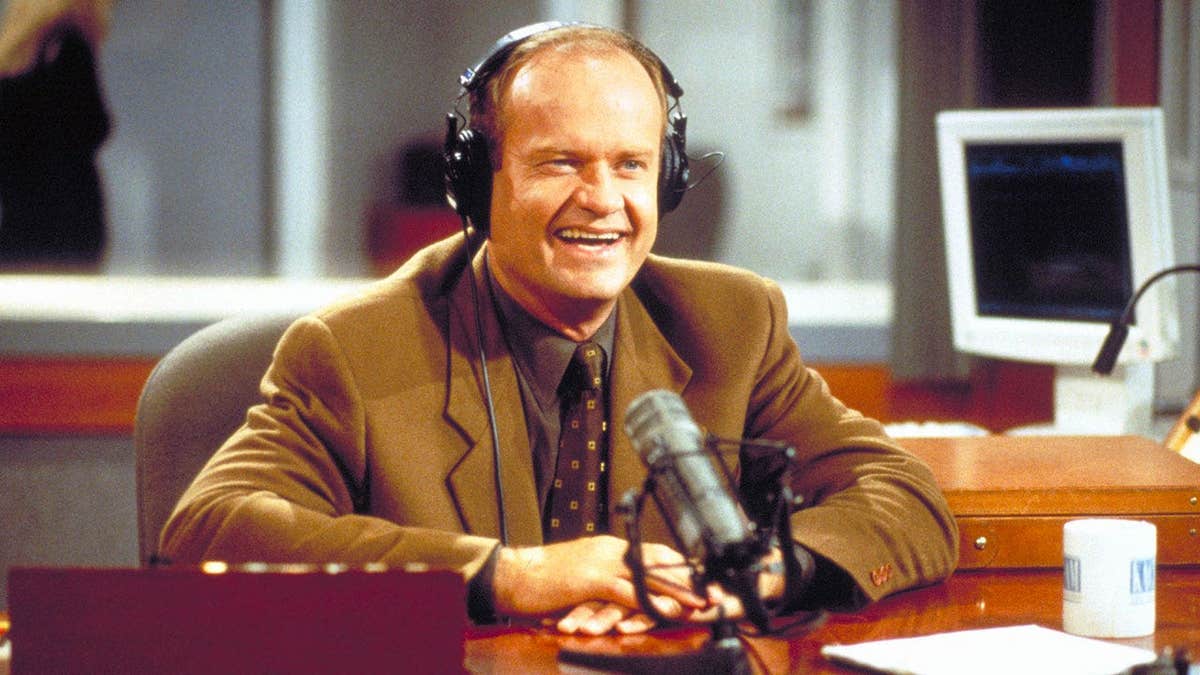 Kelsey Grammer in character at a radio station as Dr. Frasier Crane.