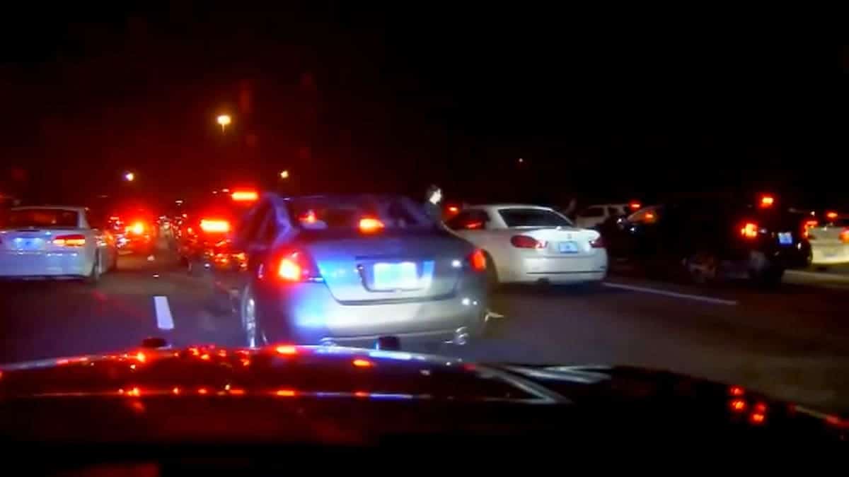 Hundreds of vehicles blocked Interstate 75 during a Florida street takeover captured on Florida Highway Patrol dashcam video.