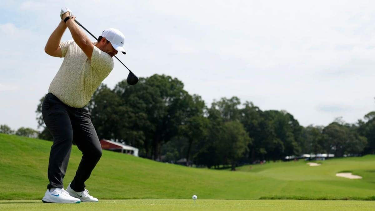 Chris Gotterup hits his tee shot during the first round of the 2025 TOUR Championship at East Lake Golf Club in Atlanta, Georgia.