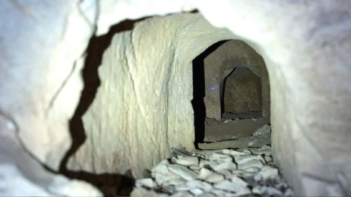View of dark tunnel in ancient Israeli cave