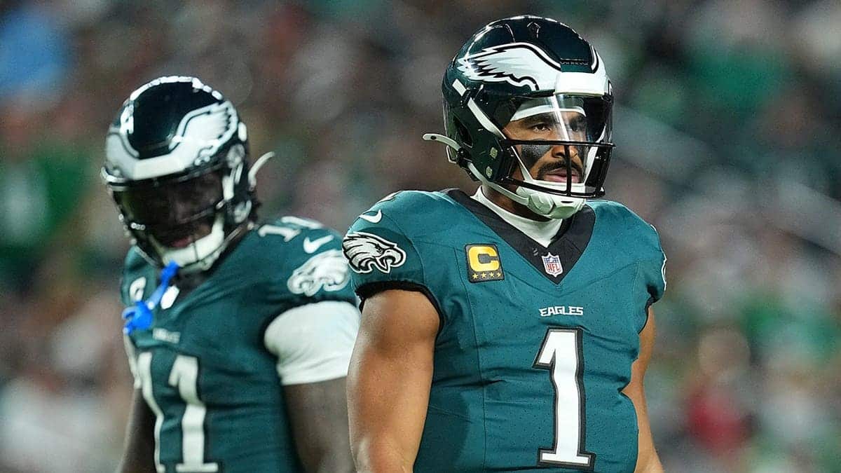 Jalen Hurts and A.J. Brown look on during a Philadelphia Eagles game