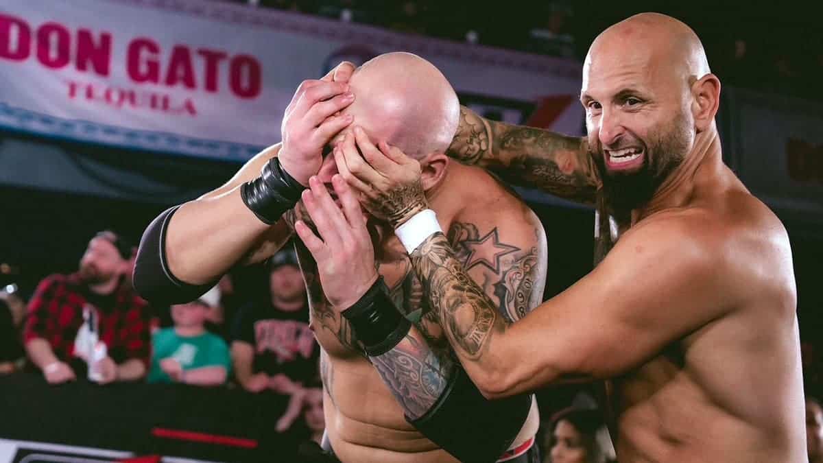 Karl Anderson grapples Bishop Dyer