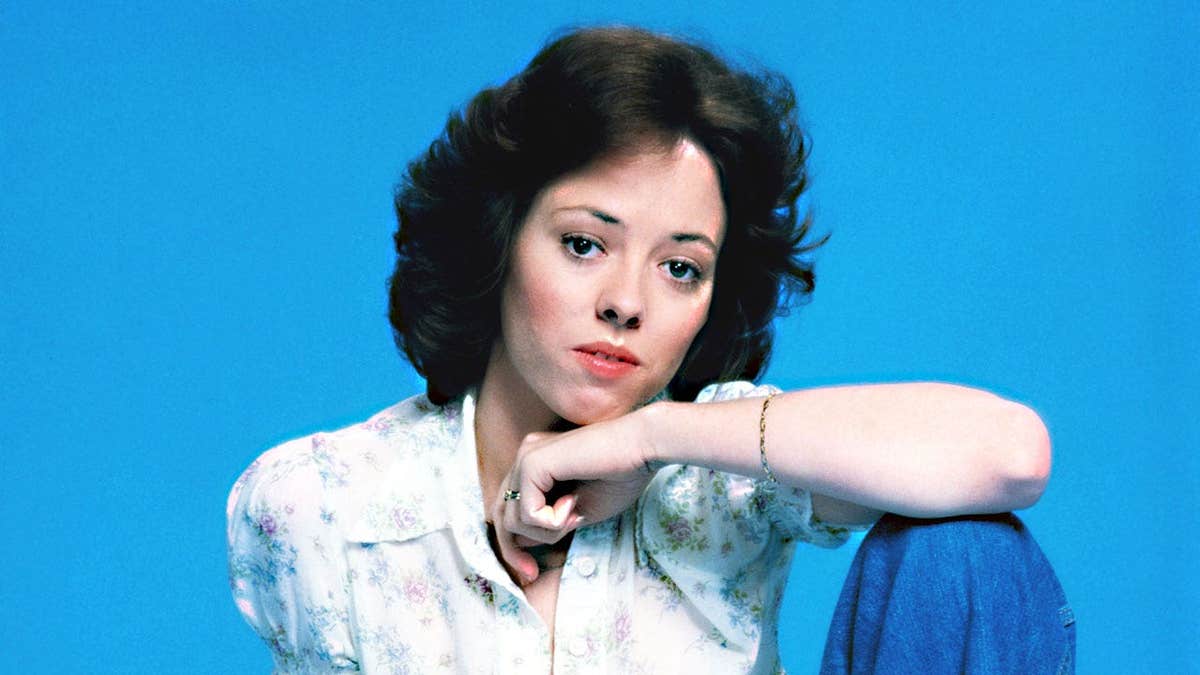 Mackenzie Phillips posing in character as Julie Cooper in