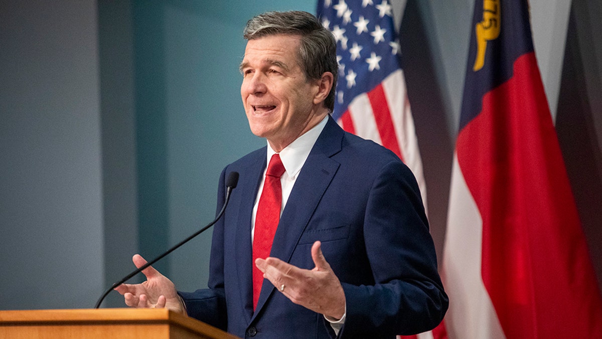 Gov. Roy Cooper speaks during a briefing on North Carolina's coronavirus pandemic response Tuesday, May 5, 2020 at the NC Emergency Operations Center in Raleigh. (Travis Long/The News & Observer via AP)
