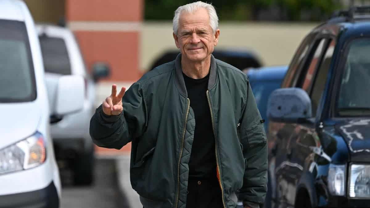 Peter Navarro, White House trade advisor to former US President Donald Trump, arrives to speak to the press at the Country Mall Plaza before reporting to the Federal Correctional Institution, in Miami, Florida on March 19, 2024.