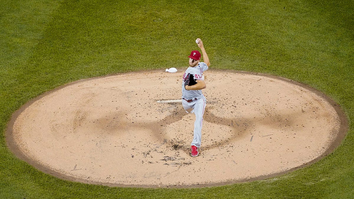 Philadelphia Phillies pitcher Zack Wheeler delivers against the New York Mets during the second inning of a baseball game, Friday, Sept. 17, 2021, in New York. (AP Photo/Mary Altaffer)